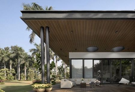 Farmhouse Pool House Blends Eco Design & Luxury